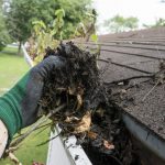 Gutter cleaning with hand